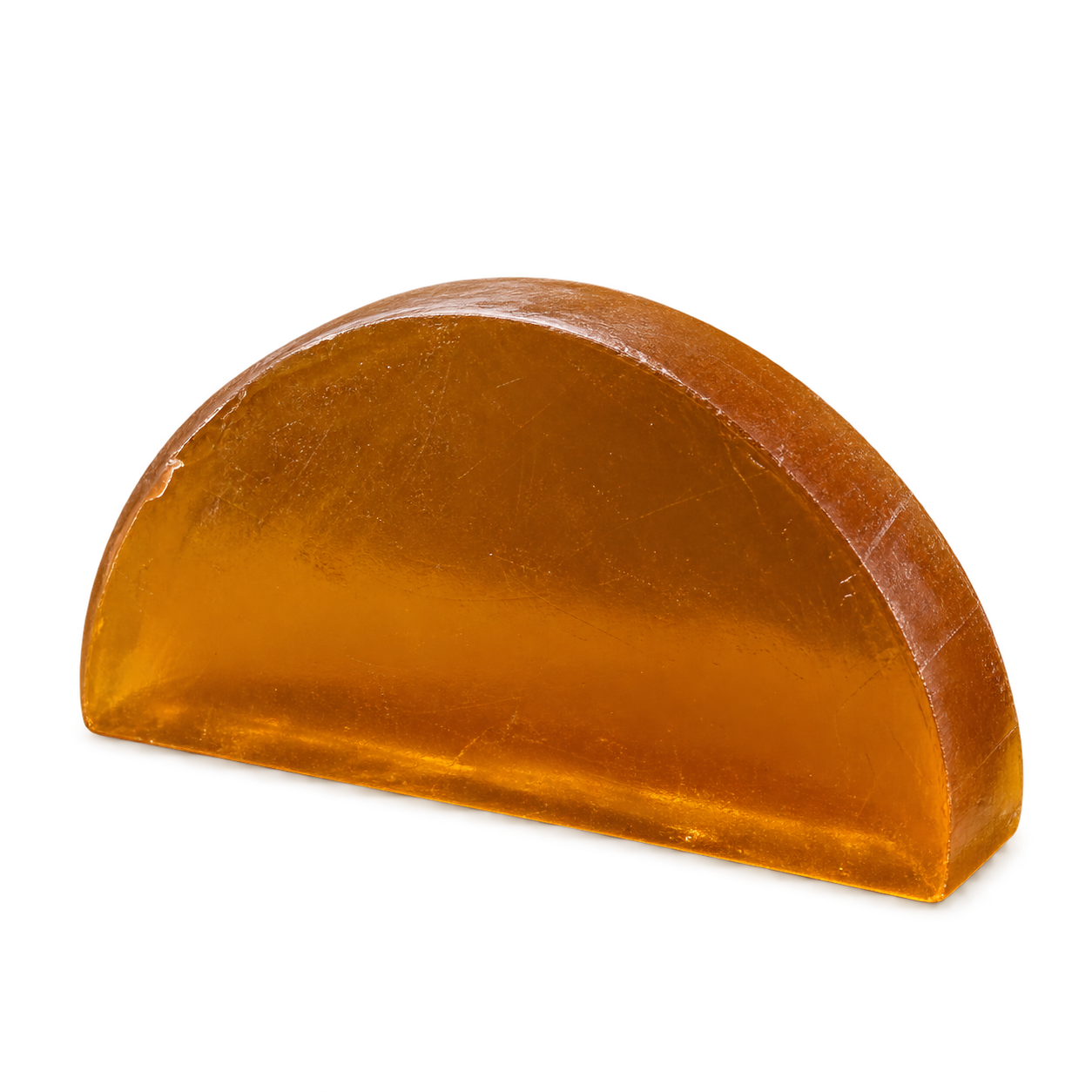 Warm amber-brown half-moon Lu.Flo coconut glycerin soap, 50 grams